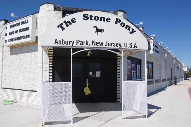 Exterior of The Stone Pony music hall. The awning over the front door reads THE STONE PONY ASBURY PARK NEW JERSEY USA.