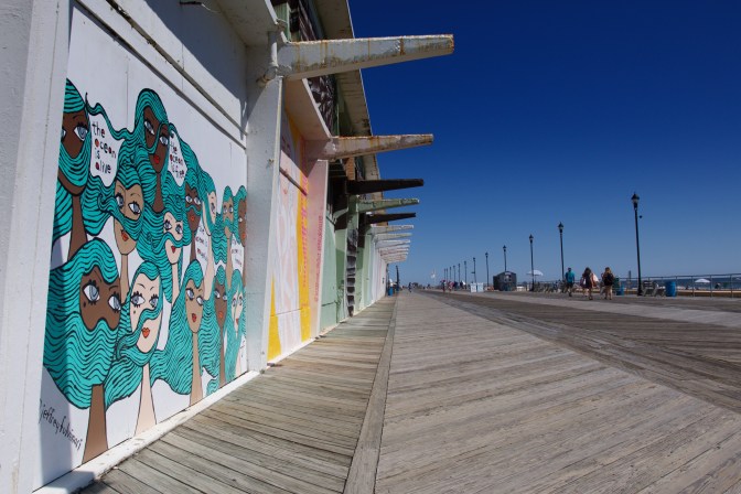 View of murals and boardwalk.