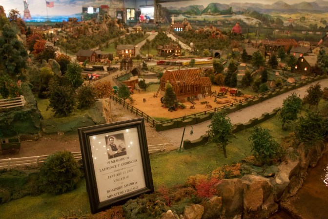 Photo in a frame. Text on it says IN MEMORY OF LAURENCE T. GIERINGER.