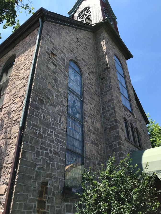 Exterior of Marsha Brown, a restaurant located in a stone church.