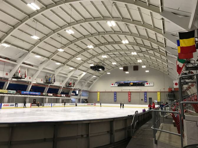 1932 Arena, with figure skaters on the ice.