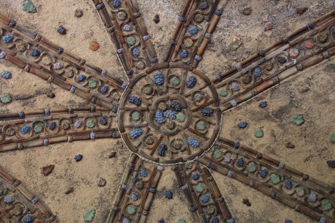 Tile mosaic on ceiling.
