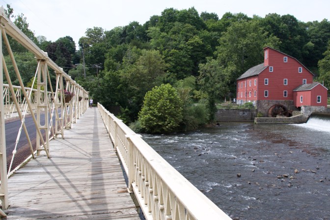 View of the Main Street Bridge from the pedestrian path on the side of the bridge. The Red Mill is visible to the right.