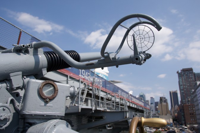 Anti-aircraft gun on the side of the ship.