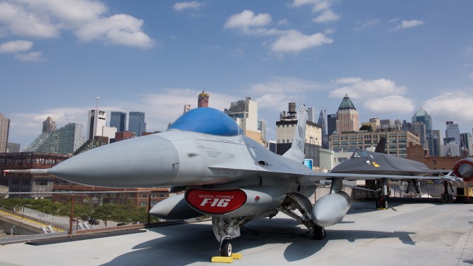 F-16 Falcon jet on carrier deck.