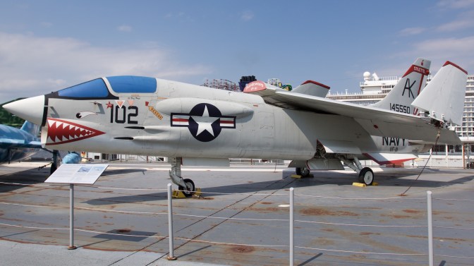 Vought F-8 Crusader on carrier deck.