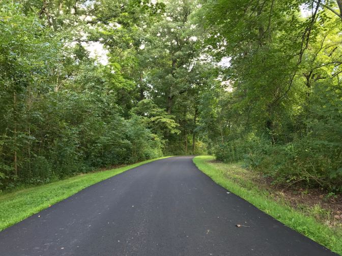 Paved trail through Duke Farms.