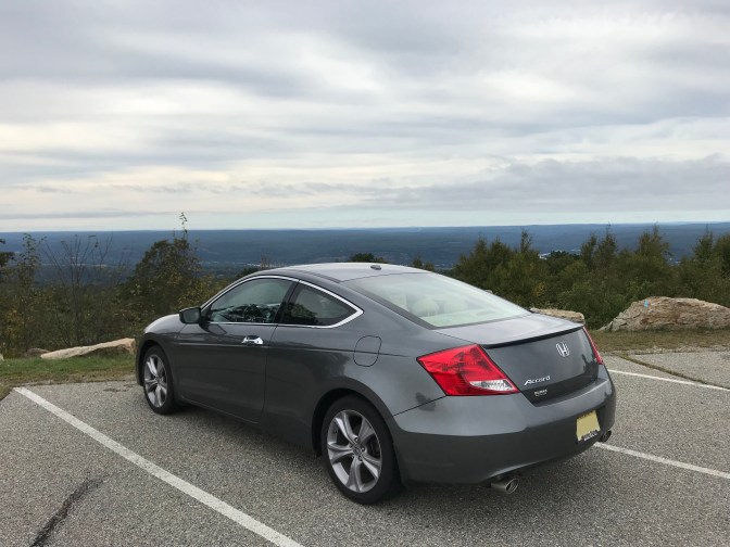 2012 Honda Accor on parking lot at high elevation.