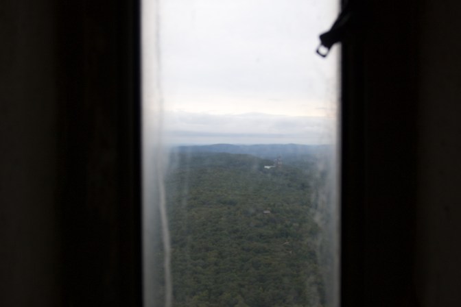 View of mountains through a window in the tower.