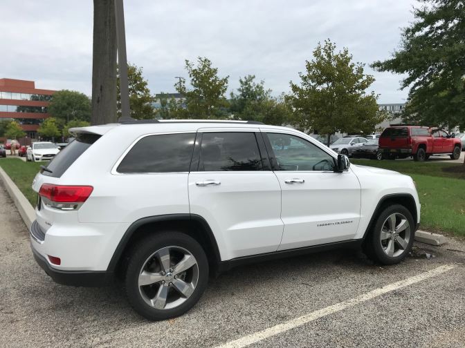 2014 Jeep Grand Cherokee, parked in a parking lot at the Navy Yard.