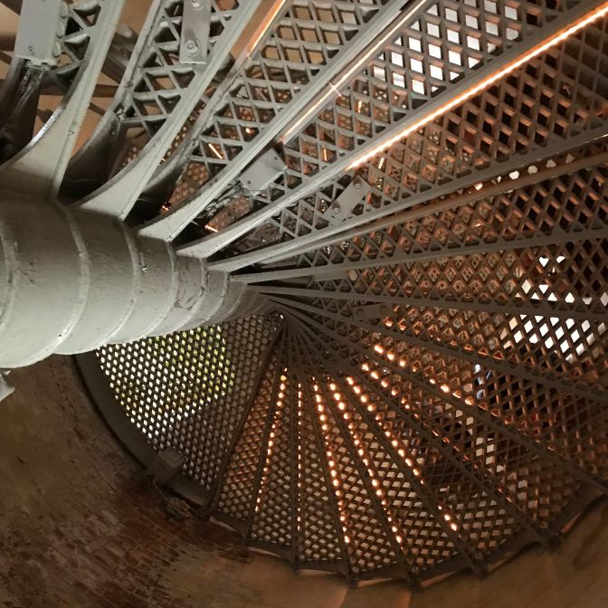 View of open stairs heading upward in Absecon Lighthouse.