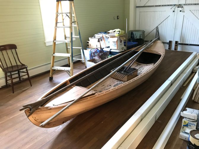 Lifeboat inside of museum, in the process of being restored.