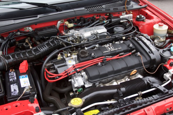 Engine bay of 1987 Acura Integra.
