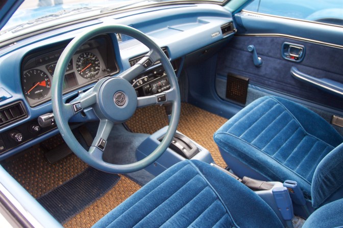 Interior of 1978 Honda Accord, in blue.