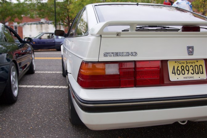 Rear view of white Sterling 827i sedan.