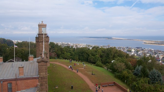 Vista from the top of the South Tower. The North Tower is in the foreground, and Sandy Hook bay is in the distance.