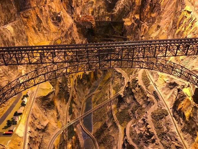 Steel trestle bridge over a large canyon.