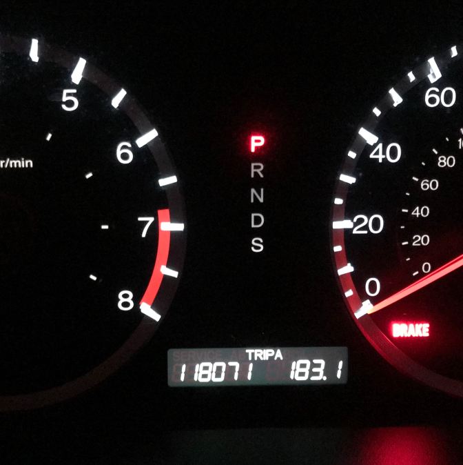Car odometer which reads 118071 miles, trip odometer 183.1 miles.