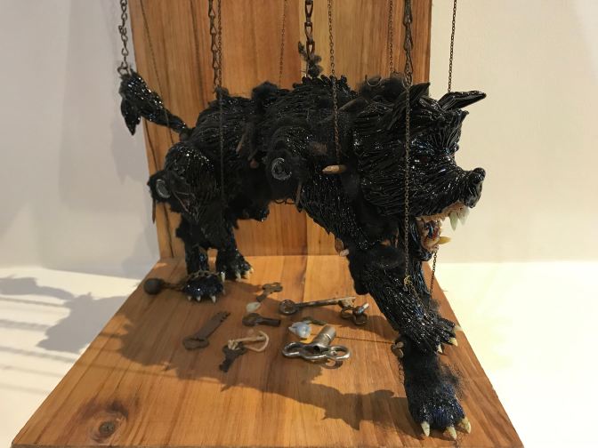 Black demon animal, in alabaster.