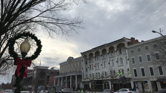 Street in Saratoga springs, with historic buildings across the street.