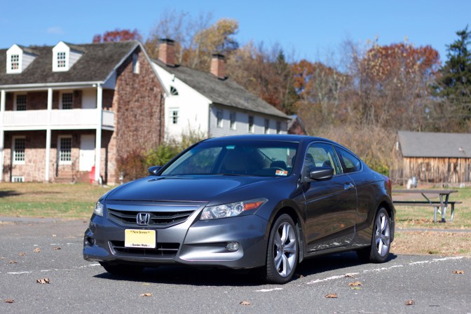 2012 Honda Accord coupe in front of historic buildings.
