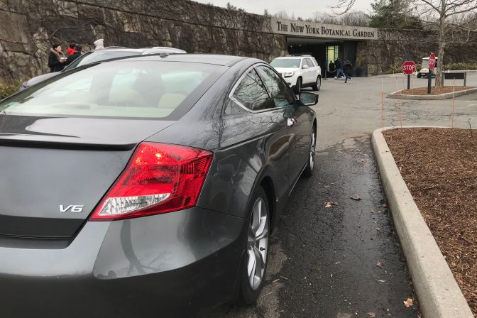 2012 Honda Accord in front of New York Botanical Garden sign.
