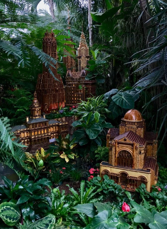 Collection of famous buildings from lower Manhattan including the Chrysler Building and the Empire State Building.