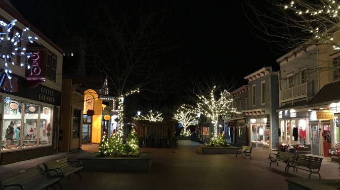 Downtown Cape May, with shops and trees still decorated with Christmas lights.
