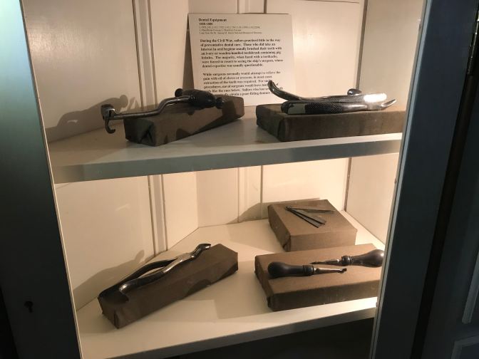 Display case with tools of 19th century surgery.