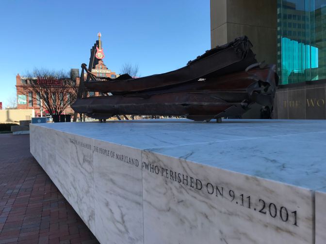 Marble plint in front of World Trade Center with steel girders from New York City World Trade Center.