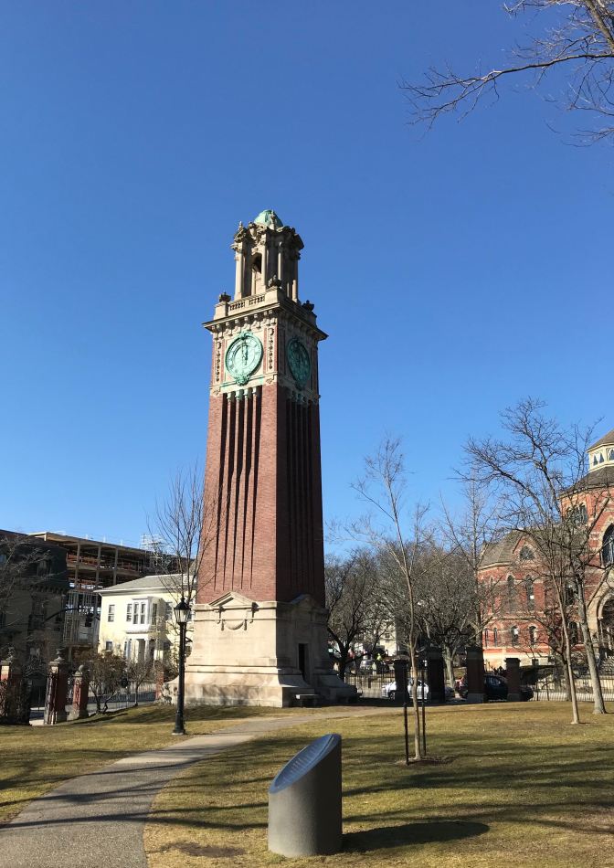 Carrie Tower, a brick and marble clock tower.