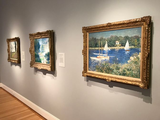 Three paintings by Monet.