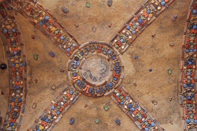 Tile mosaic in the vaulted ceiling.