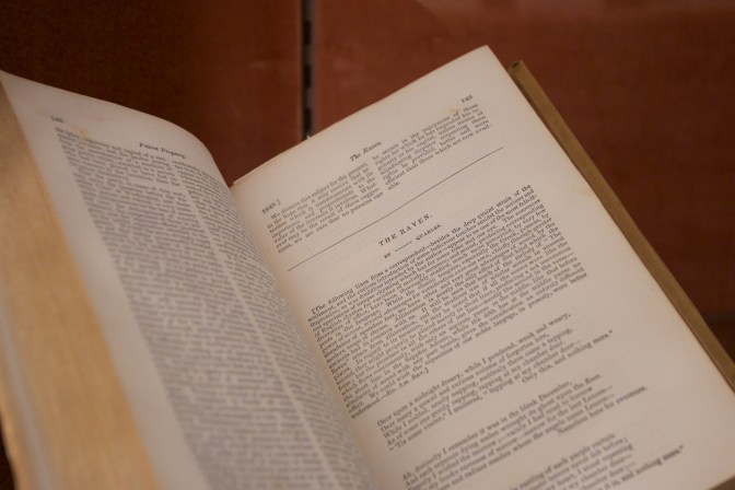 Book of stories, open to The Raven, by Poe.