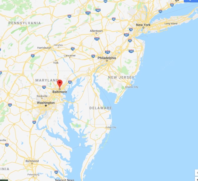 Map of Delaware, Maryland, New Jersey, and Pennsylvania, with a red pin in the location of Baltimore.