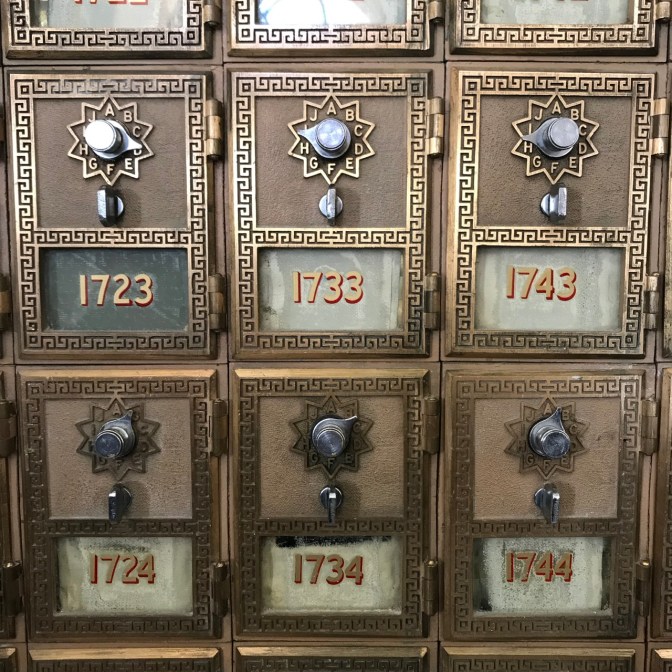 Metal and brass post office boxes with numbers 1723 1733 1743 1724 1734 1744