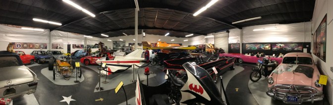 Panorama of Hollywood Car Museum interior.