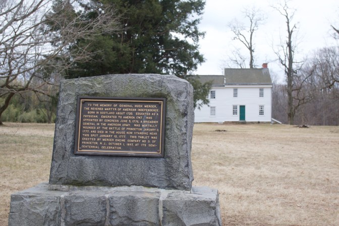 Stone marker indicating where General Hugh Mercer fell. The Clarke House is in the background.