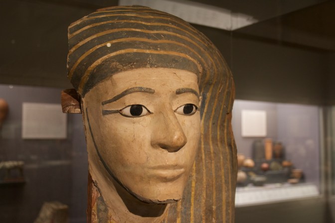 Mummy mask, partially damaged.