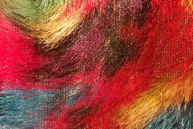 Multicolored woven thread.