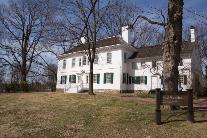 Exterior of Ford Mansion, a two-story mansion in white, with black roof and shutters.