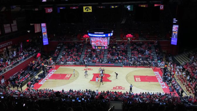 View of Rutgers Athletic Center during a Rutgers-Penn State basketball game. The game is at tip-off.