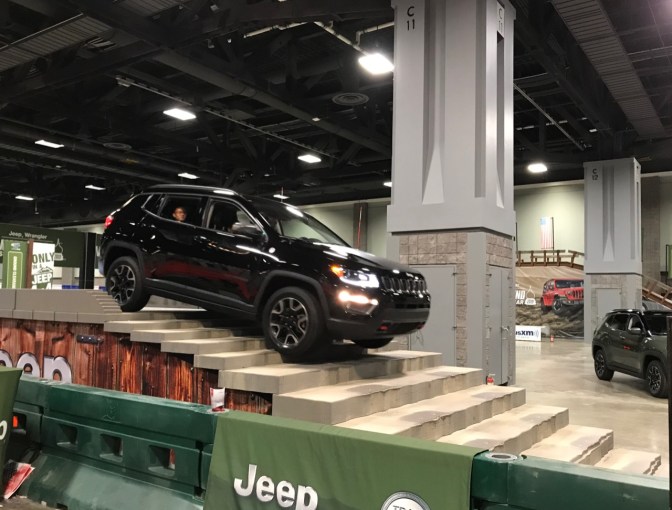 Black Jeep Cherokee descending a staircase.
