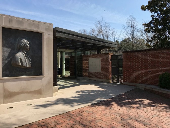 Exterior of Ford Education Center, with a relief of George Washington on the left.