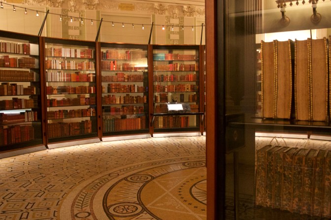 Thomas Jefferson's Library, in a series of circular bookshelves. A tile mosaic is on the floor.