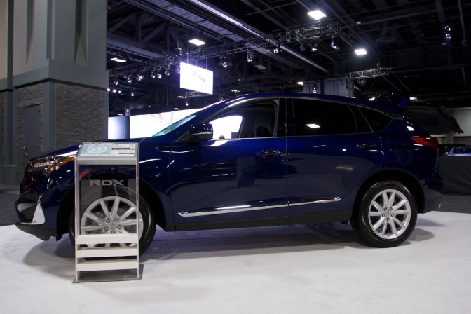 Midnight blue Acura RDX on display.