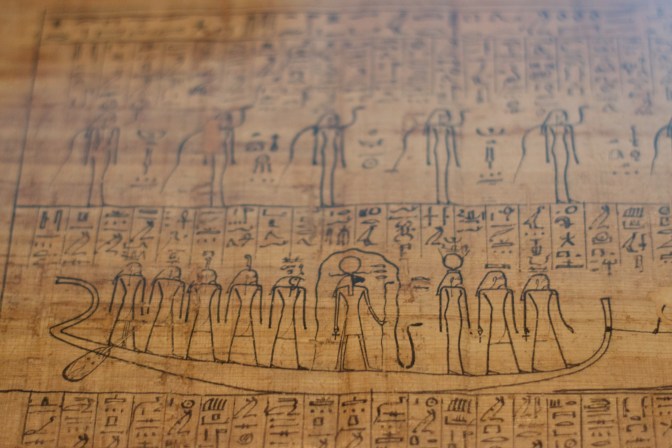 Hieroglyphyics of a boat in the book of the dead.