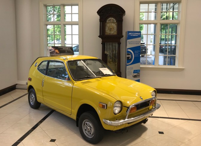 Yellow Honda Z600 coupe.
