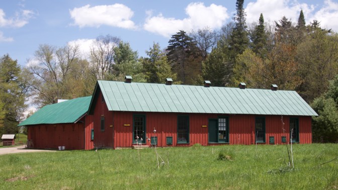 Two long, narrow buildings in Great Camp Sagamore.
