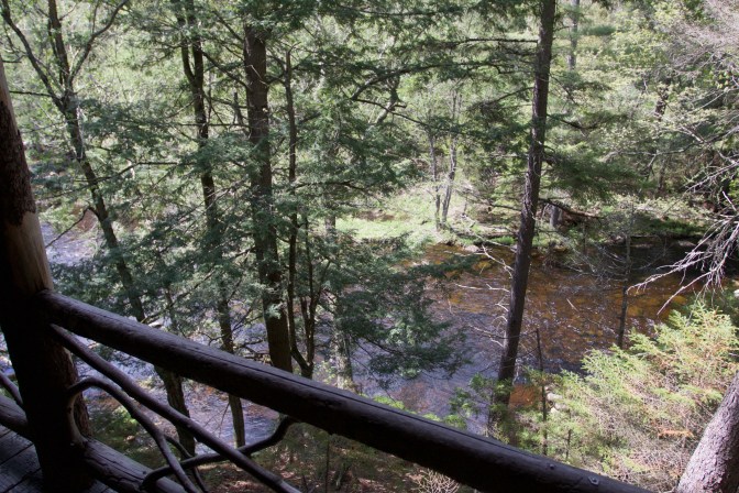 Balcony at back of Wigwam with a view toward stream.